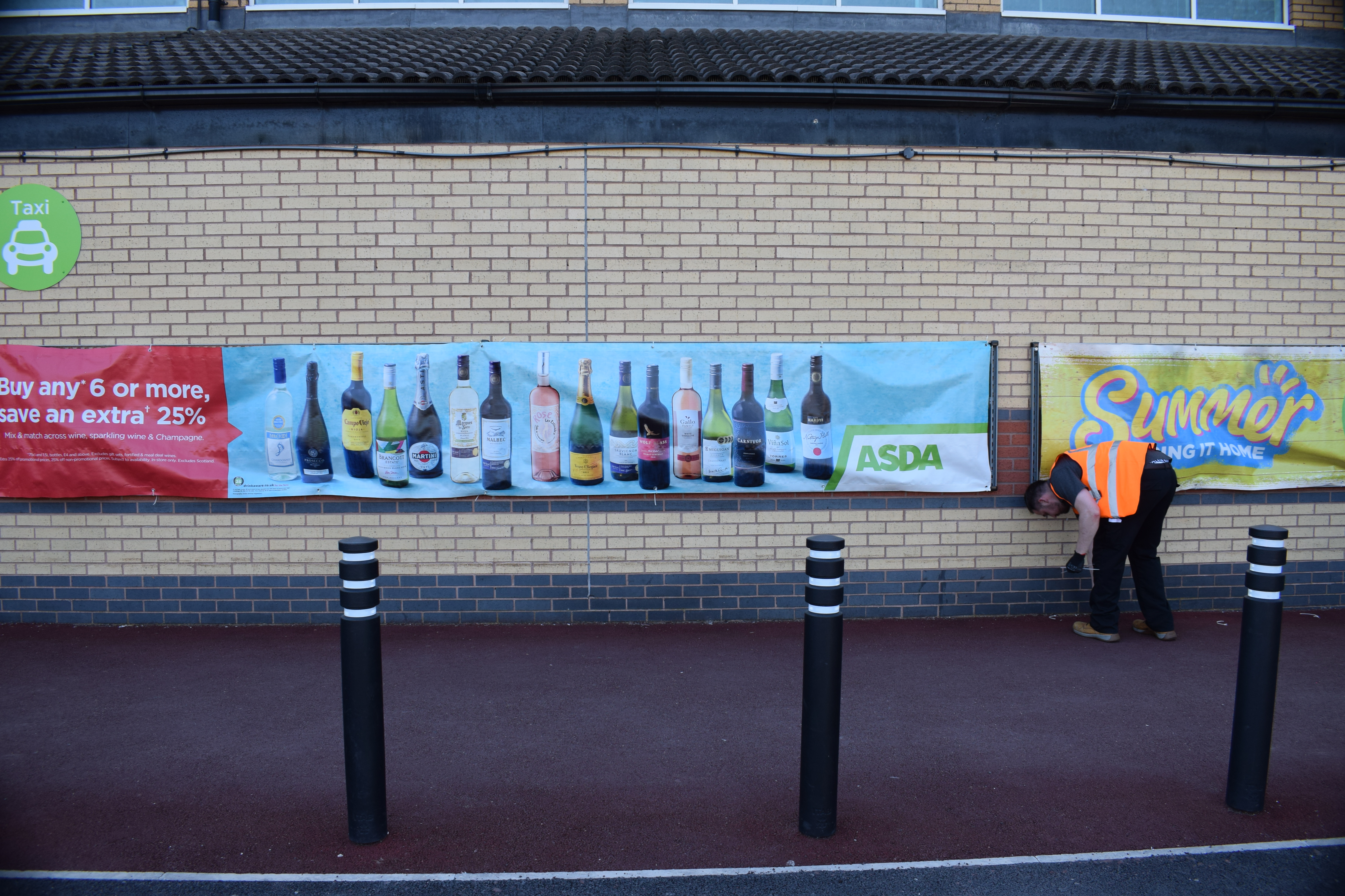 Asda POS Installation - Large Banner Installation